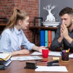 Colleagues in a supportive coaching conversation