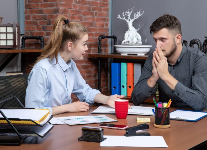 Colleagues in a supportive coaching conversation