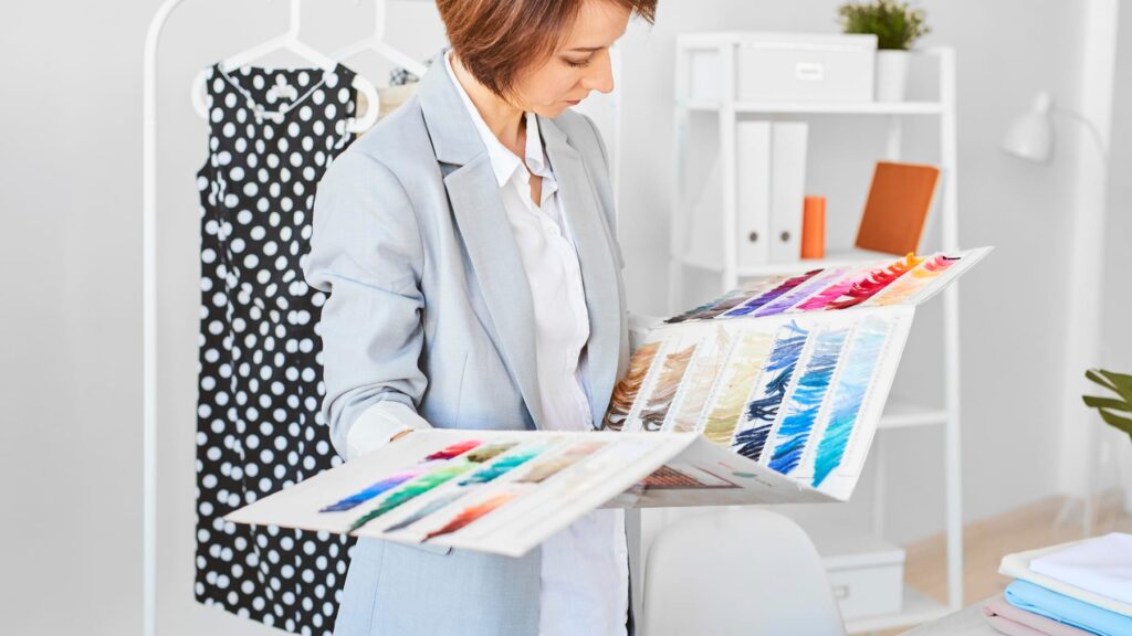 Fashion professional reviewing a clothing color palette